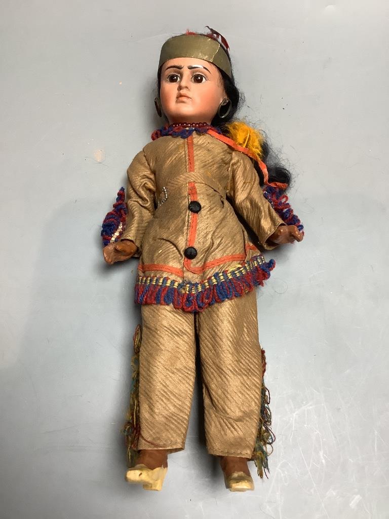 A Georgian Indian bisque character doll, all original costume